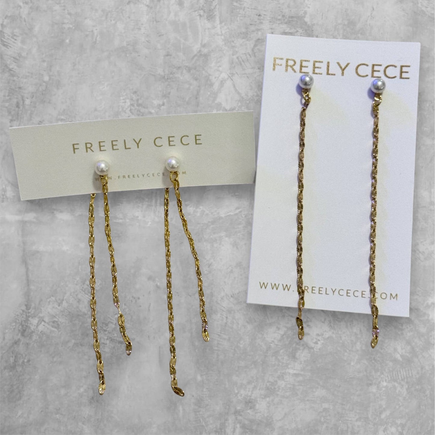 Soubke pearl chain duster earrings
